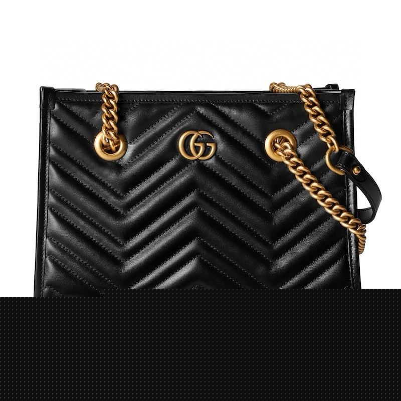 G*u*i shopping bags
